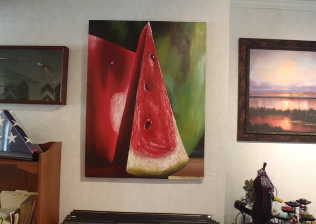 Framed artwork in the gallery